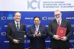 ICI Bucharest и Национальный институт цифровых технологий и цифровой трансформации Вьетнама обмениваются меморандумом о взаимопонимании по сотрудничеству в присутствии премьер-министра Фам Минь Тьиня. (Фото: ВИA)