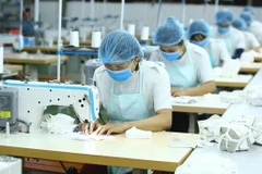 COVID-19 сильно повлиял на работающих женщин во Вьетнаме, увеличив гендерный разрыв на рынке труда. (Фото: ВИА) 