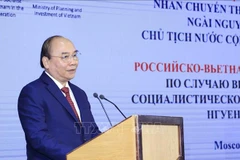 Президент Нгуен Суан Фук выступает на бизнес-семинаре Вьетнам - Россия. (Фото: Тхонг Нят/ВИА)