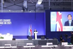 Премьер-министр Фам Минь Тьинь выступает с речью на COP26. (Фото: ВИА) 