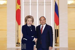 Президент государства Нгуен Суан Фук встречается с председателем Совета Российской Федерации Валентиной Матвиенко. (Фото: ВИA)