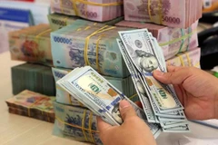 По состоянию на конец сентября в экономике страны зарегистрировано более 12,7 квадриллиона донгов (517,5 млрд. долл. США) кредитов, что на 6,92% больше, чем в конце 2022 года. (Фото: ВИА)
