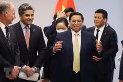 Премьер-министр Фам Минь Тьинь принимает руководителей Asia Group и корпораций, инвестирующих во Вьетнам: Blackstone, GenX, AES, Exxon Mobil. (Фото: ВИА)