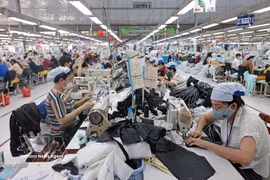 Акционерная швейная корпорация Viet Tien в провинции Кханьхоа инвестирует в современное оборудование для увеличения объёмов производства и повышения качества продукции. Фото: ВИА.