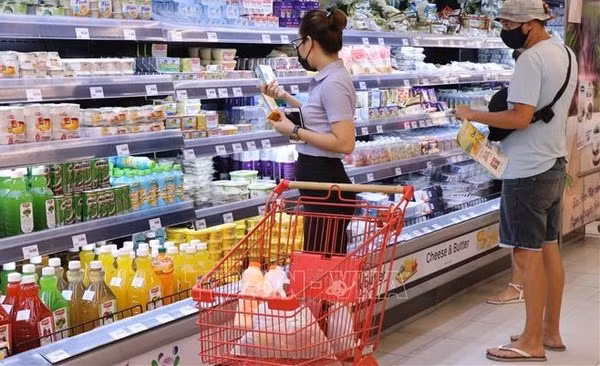 Потребители предпочитают выбирать вьетнамские товары ảnh 1