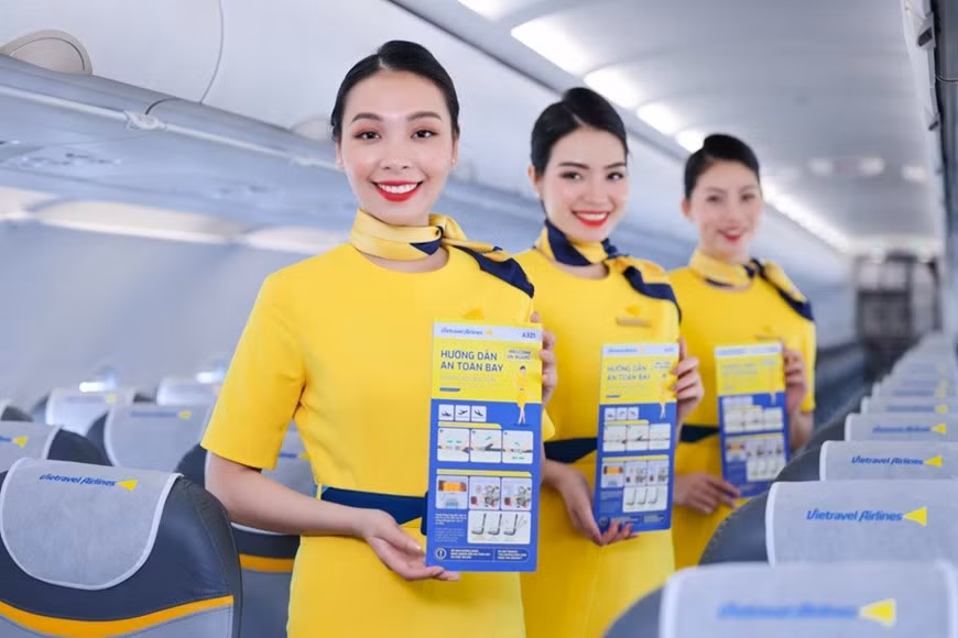 Компания Vietravel Airlines представила новую униформу и символ IATA ảnh 5