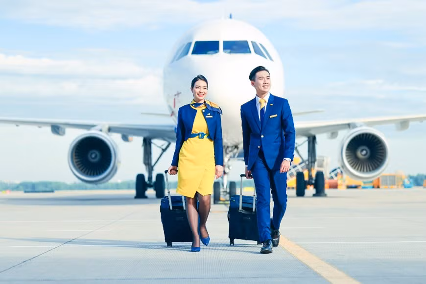 Компания Vietravel Airlines представила новую униформу и символ IATA ảnh 3