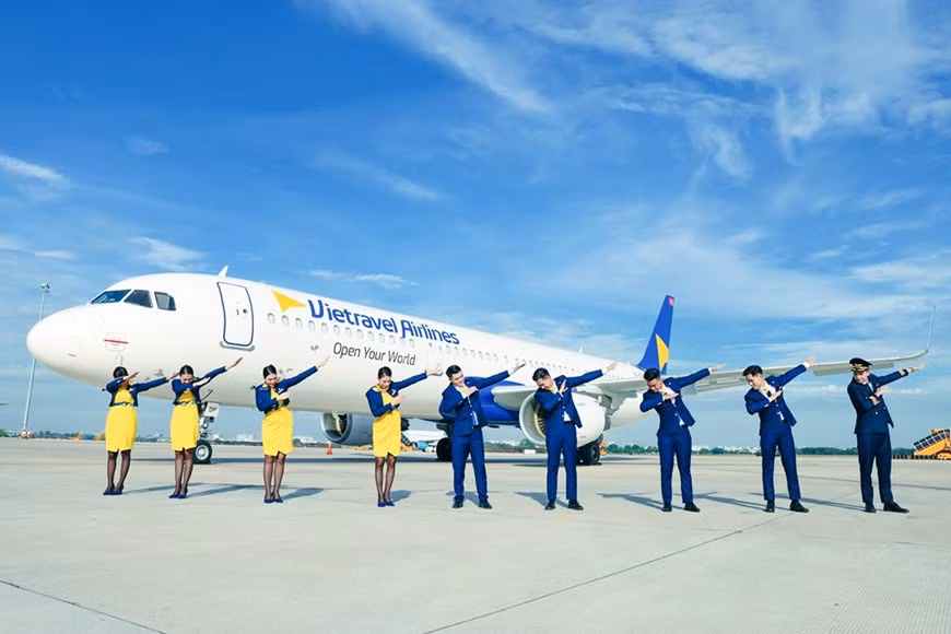 Компания Vietravel Airlines представила новую униформу и символ IATA ảnh 4