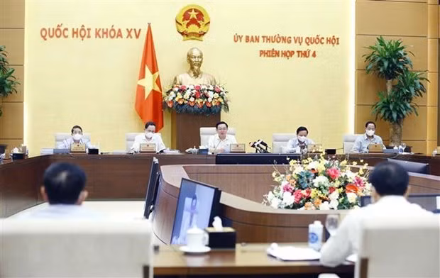 4-я сессия постоянного комитета НС: распланировать земельный фонд, удовлетворяющий развитие инфраструктуры ảnh 1