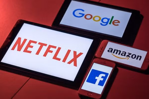 За первые 6 месяцев года Google, Apple, Facebook, Netflix, TikTok... выплатили в бюджет почти 4 трлн донгов ảnh 1