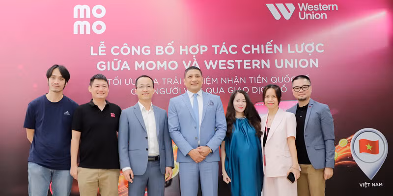 MoMo - партнер Western Union по денежным переводам во Вьетнаме ảnh 1