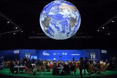 Делегаты на Конференции сторон РКИК ООН (COP26) в Глазго, Шотландия, 2 ноября 2021 года. Фото: AFP/ВИА