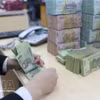 Создана государственная компания по управлению активами кредитных организаций с уставным капиталом 5 трлн донгов. (Фото: ВИА) 