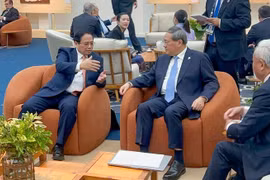Премьер-министр Вьетнама Фам Минь Тьинь встретился с премьер-министром Госсовета Китая Ли Цянем (Фото: ВИА)